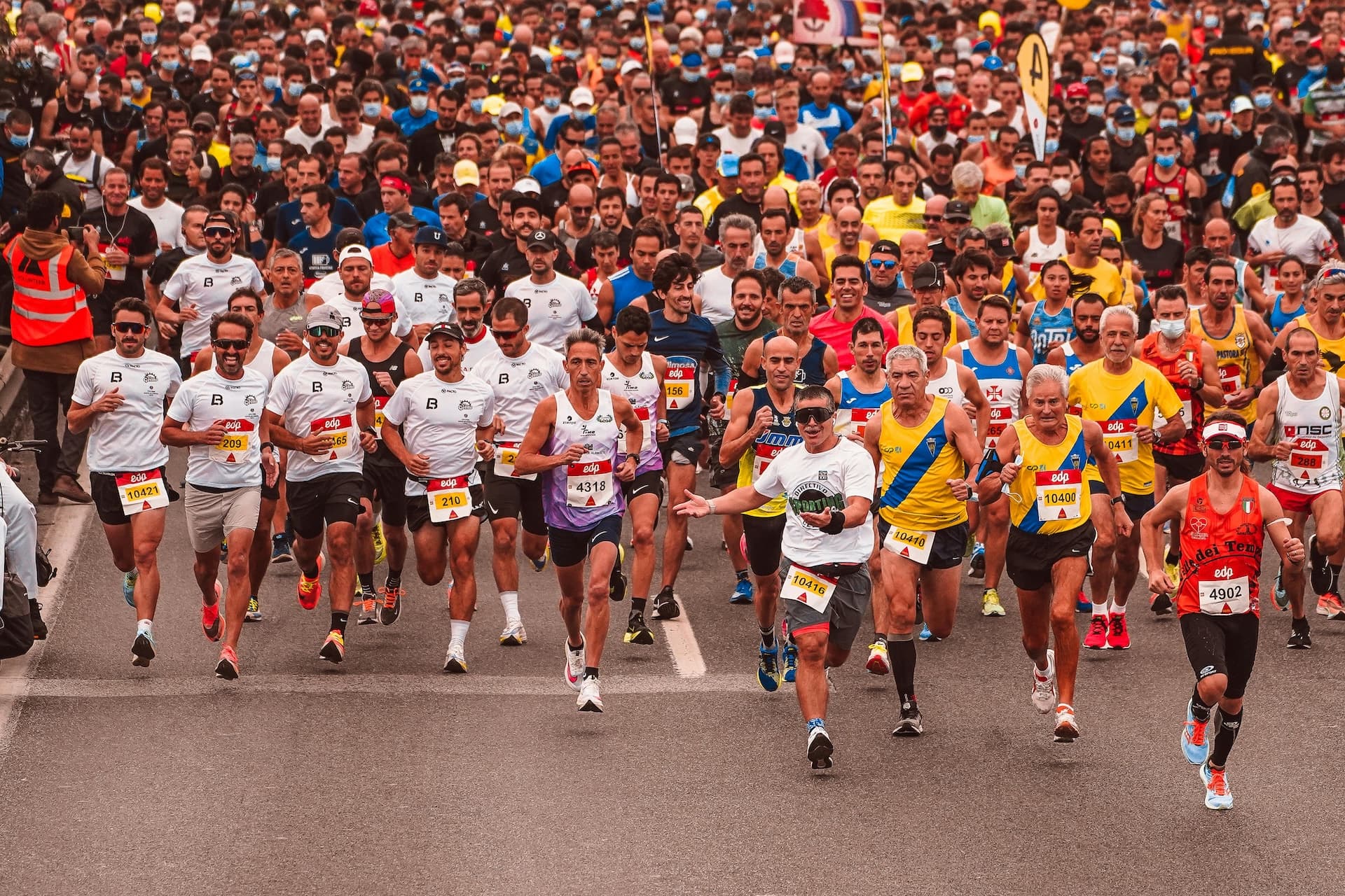 Large crowd of marathon runners during event week showing the scale of events Kala helps manage